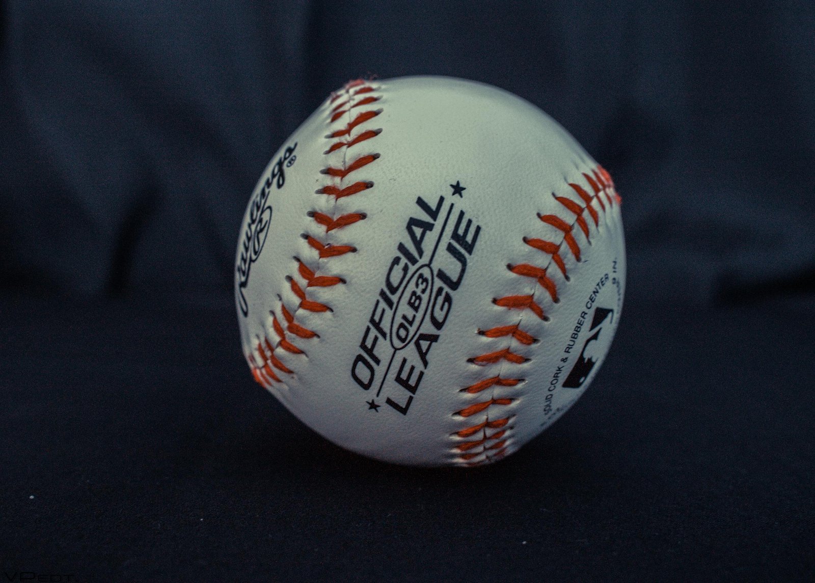 Oklahoma State closes regular season with series win 1 Detailed close-up of an official league baseball with visible branding and stitches.